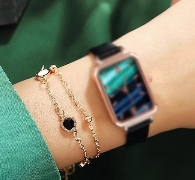 Gold Toned Black White Charm Bracelet for Women - Image 2