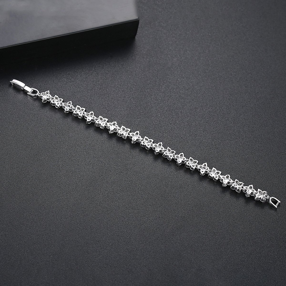 Silver Flower Bracelet for Women with Sparkling Stones - Image 4